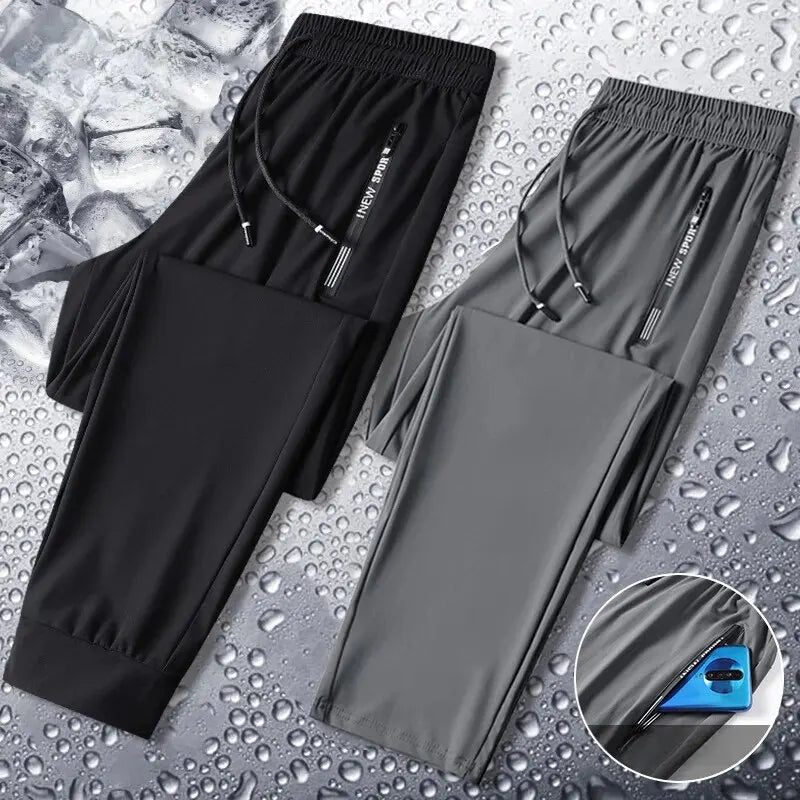 Calça esportiva fina de seda de gelo masculina, estilo solto, calça casual seca rápida, longa respirável, alta elasticidade, verão